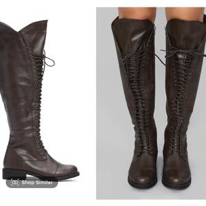 Brown knee high boots.